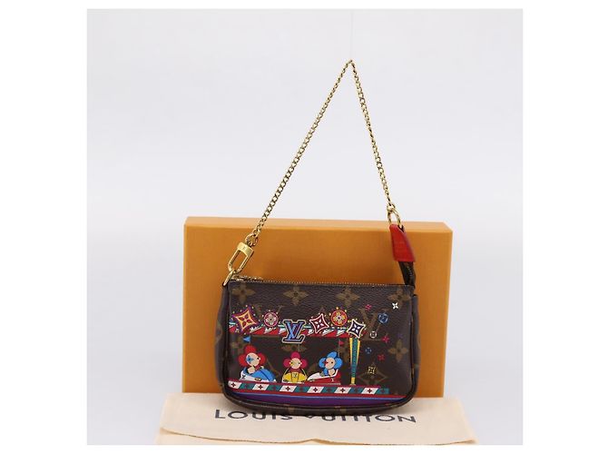 LOUIS VUITTON Monogram Vivienne Mini Pochette Accessoires M69976 - vista 12
