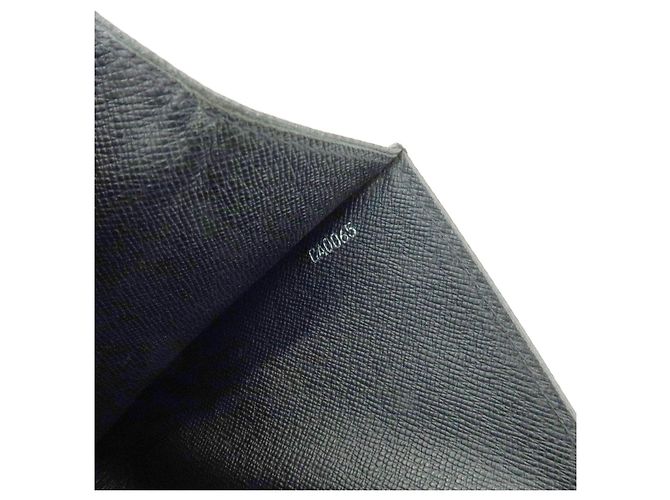 Louis Vuitton Selenga Pochette Taiga Leather - vista 7