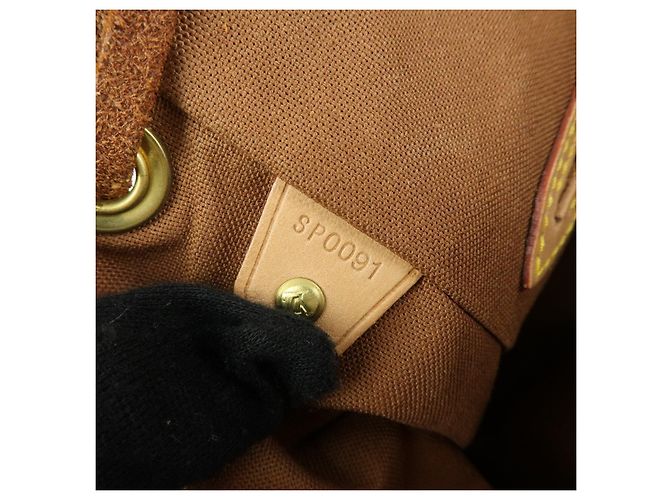 Zaino Louis Vuitton Monogram Montsouris MM Brown M51136 - vista 21