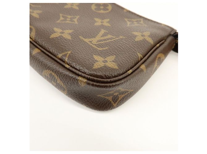Louis Vuitton Monogram Mini Pochette Accessoires Hand Bag Bown M58009 - vista 11