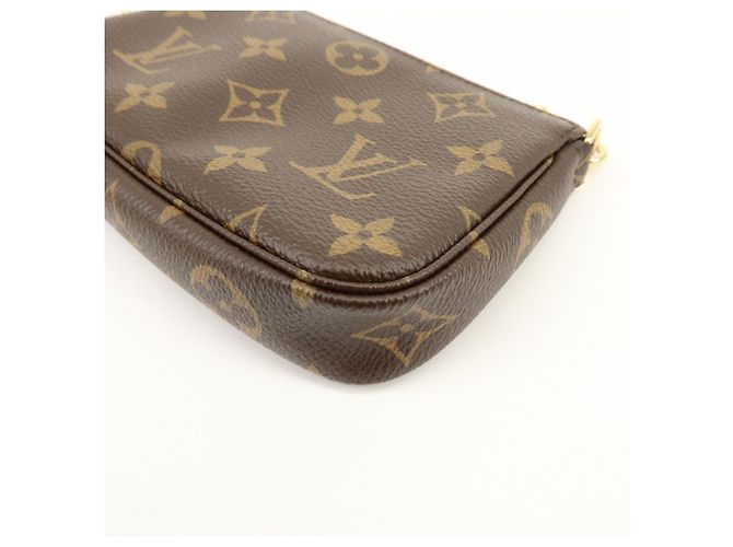 Louis Vuitton Monogram Mini Pochette Accessoires Hand Bag Bown M58009 - vista 13
