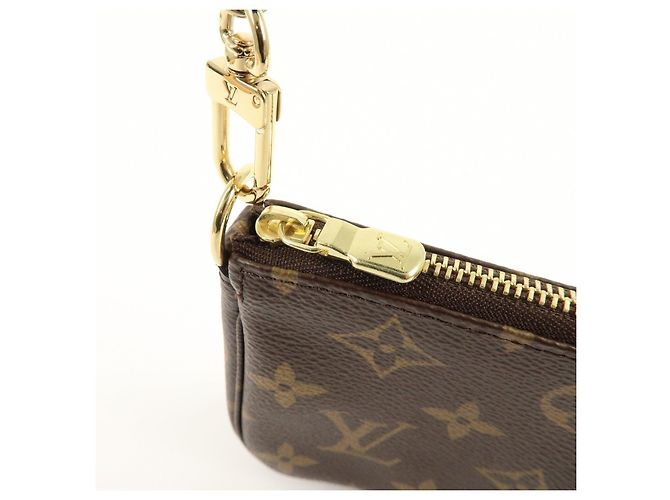 Louis Vuitton Monogram Mini Pochette Accessoires Hand Bag Bown M58009 - vista 18