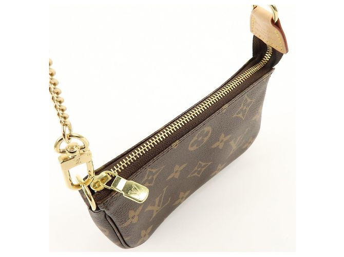 Louis Vuitton Monogram Mini Pochette Accessoires Hand Bag Bown M58009 - vista 19