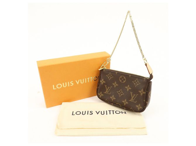 Louis Vuitton Monogram Mini Pochette Accessoires Hand Bag Bown M58009 - vista 23