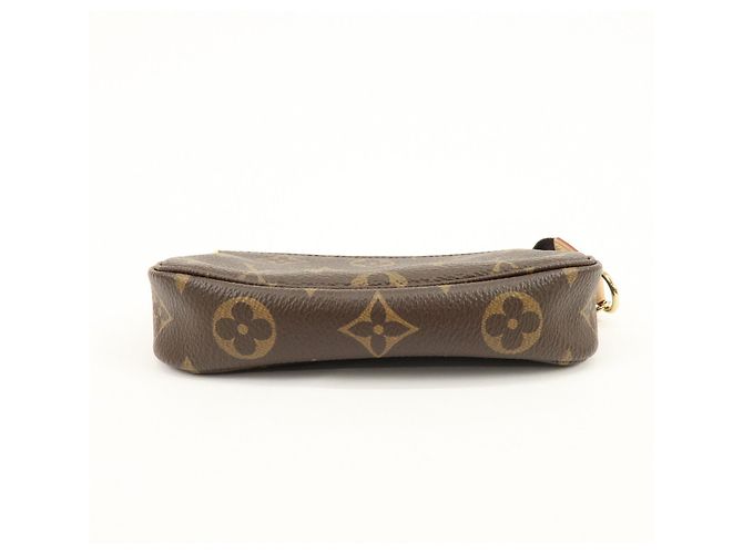 Louis Vuitton Monogram Mini Pochette Accessoires Hand Bag Bown M58009 - vista 5