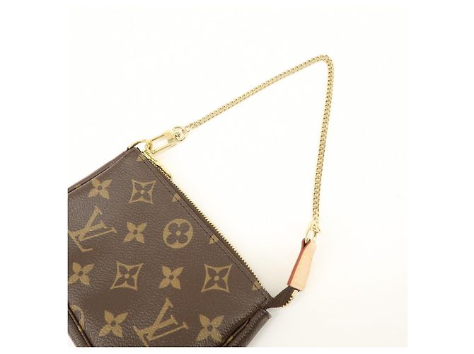 Louis Vuitton Monogram Mini Pochette Accessoires Hand Bag Bown M58009 - vista 6