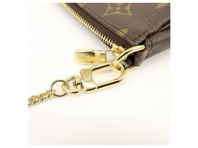 Louis Vuitton Monogram Mini Pochette Accessoires Hand Bag Bown M58009 - vista 7