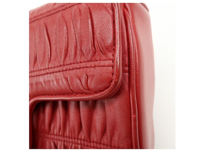 Borsa a tracolla con catena PRADA in pelle di capra nappa rossa 1BD140 - vista 17