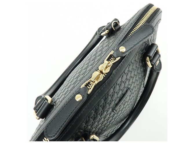 GUCCI Borsa a mano e a tracolla 2WAY in pelle Micro Guccissima Nero 449663 - vista 20
