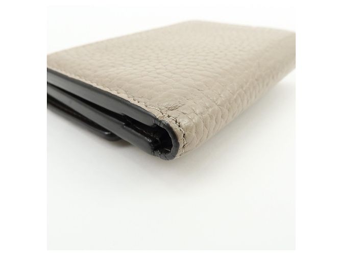 Louis Vuitton Portefeuille Capucines Galet Compact Wallet Galet M68747 - vista 8