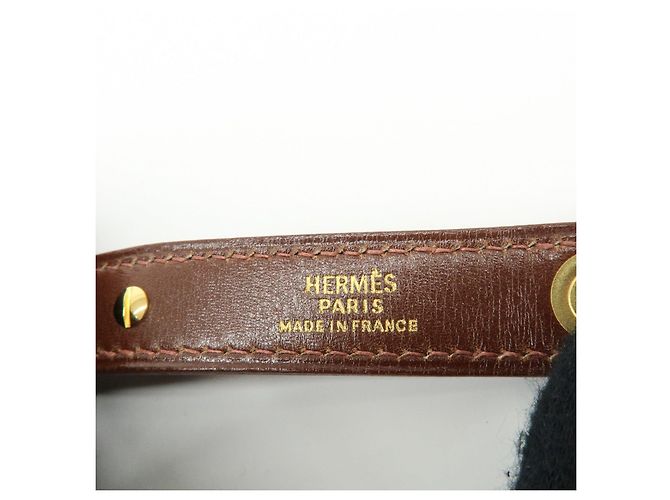 Hermès HERMES Portaguanti Nomad in pelle e metallo Charm Brown - vista 13