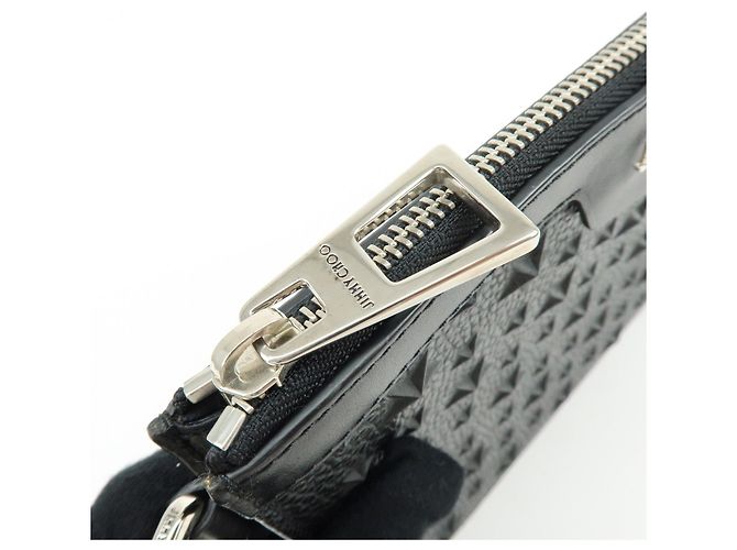 JIMMY CHOO Pochette in pelle con stelle embossed e borchie Wristlet Pouch Black - vista 18