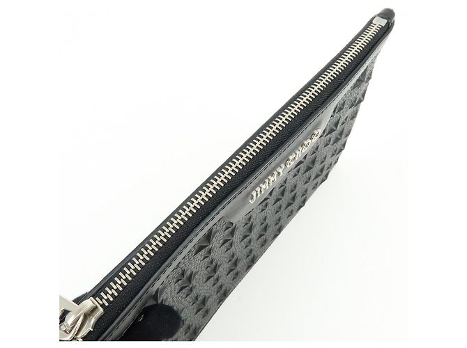 JIMMY CHOO Pochette in pelle con stelle embossed e borchie Wristlet Pouch Black - vista 19