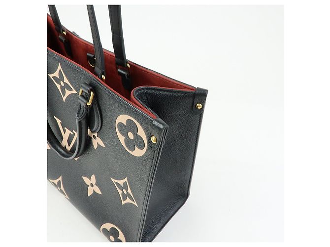 Borsa Tote Louis Vuitton Bicolor Monogram Empreinte On The Go MM M45495 - vista 13