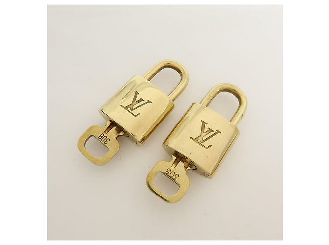 Louis Vuitton Lot de 10 Cadenas et Clés en Métal Or - vue 3