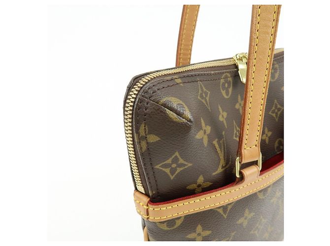 Borsa a mano e a tracolla Louis Vuitton Monogram Coussin GM Marrone M51141 - vista 14
