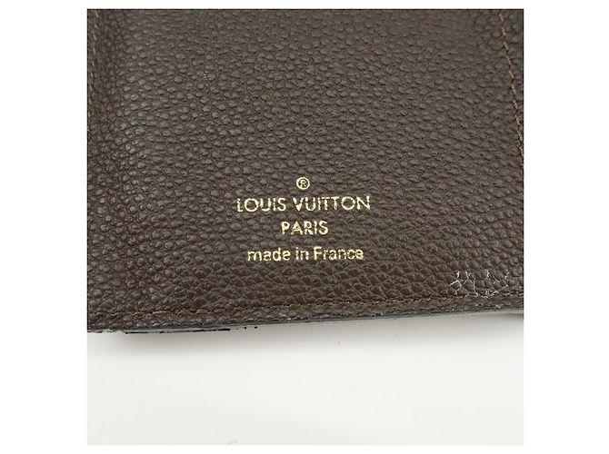 Louis Vuitton Empreinte Portefeuille Curieuse Compact Wallet M60543 - vista 22