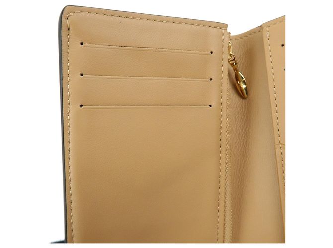 Billetera Compacta Vertical Louis Vuitton en piel Taurillon Noir M81561 - vista 11