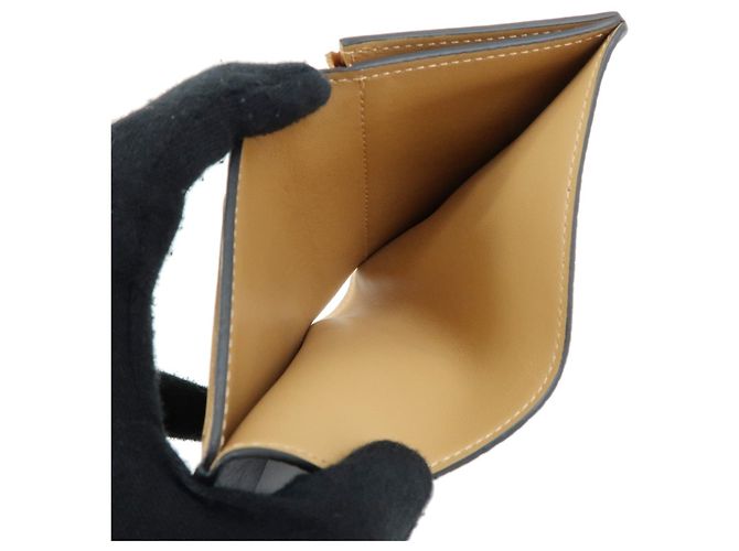 Billetera Compacta Vertical Louis Vuitton en piel Taurillon Noir M81561 - vista 9