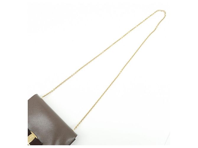 Salvatore Ferragamo Borsa a tracolla con catena Ferragamo Vara in pelle embossed con fiocco, Marrone - vista 6