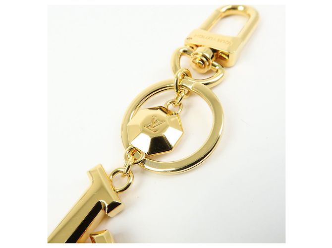 Louis Vuitton Porte Cles LV Facettes Bag Charm Gold M65216 - vista 5