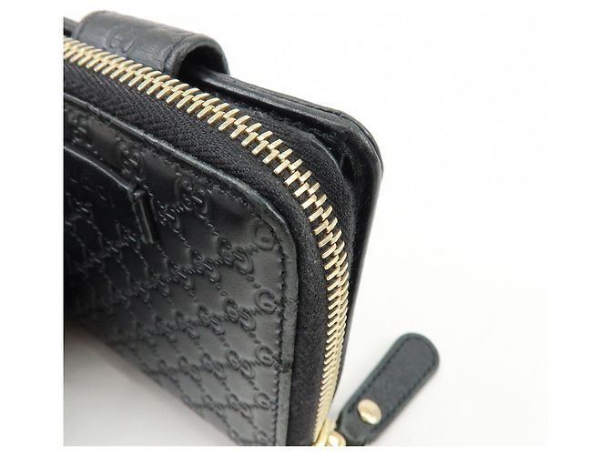 Cartera compacta bi-fold de piel Micro Guccissima GUCCI Negra 449395 - vista 10