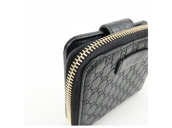Cartera compacta bi-fold de piel Micro Guccissima GUCCI Negra 449395 - vista 11