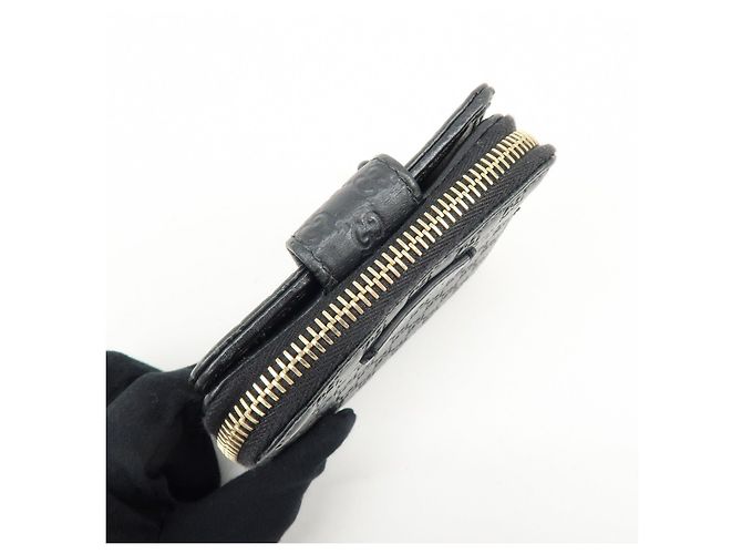 Cartera compacta bi-fold de piel Micro Guccissima GUCCI Negra 449395 - vista 12