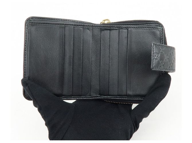 Cartera compacta bi-fold de piel Micro Guccissima GUCCI Negra 449395 - vista 16
