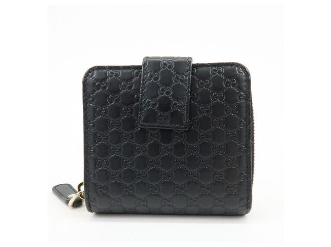 Cartera compacta bi-fold de piel Micro Guccissima GUCCI Negra 449395 - vista 2