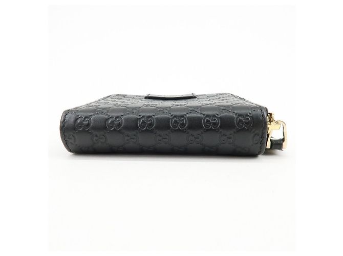 Cartera compacta bi-fold de piel Micro Guccissima GUCCI Negra 449395 - vista 5