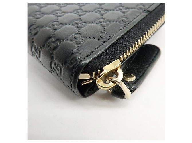 Cartera compacta bi-fold de piel Micro Guccissima GUCCI Negra 449395 - vista 7
