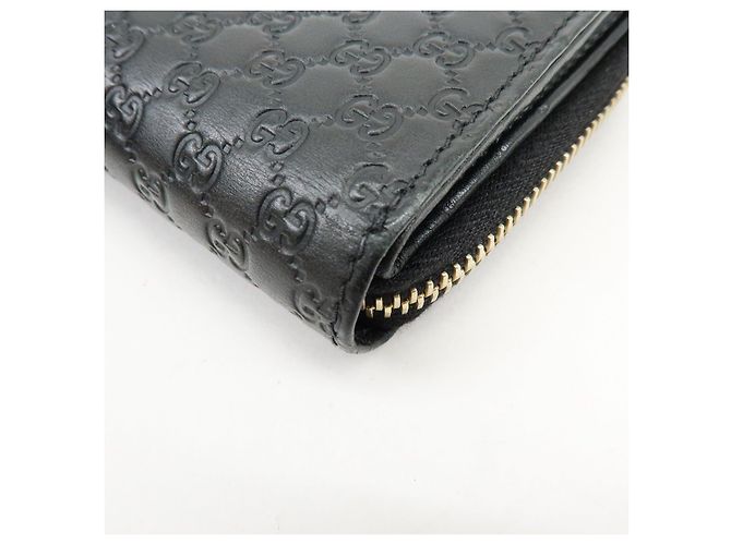 Cartera compacta bi-fold de piel Micro Guccissima GUCCI Negra 449395 - vista 9