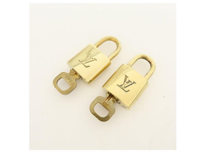 Louis Vuitton Lotto di 10 Lucchetti e Chiavi in Metallo Oro - vista 9