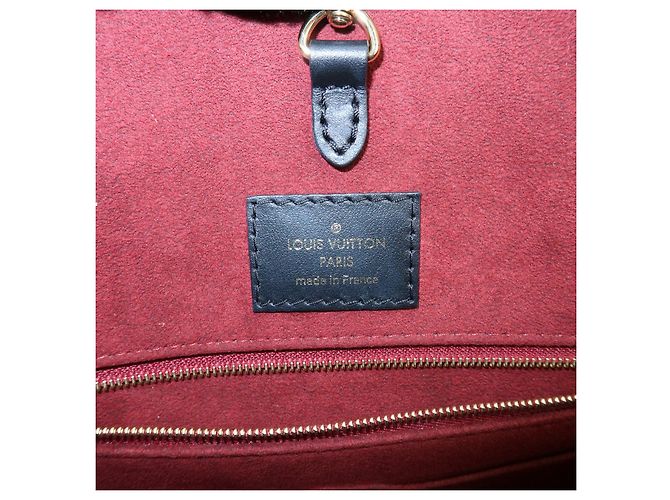 Louis Vuitton Bicolor Monogram Empreinte On The Go MM Noir Beige M45495 - vista 11