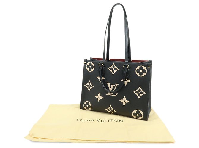 Louis Vuitton Bicolor Monogram Empreinte On The Go MM Noir Beige M45495 - vista 12