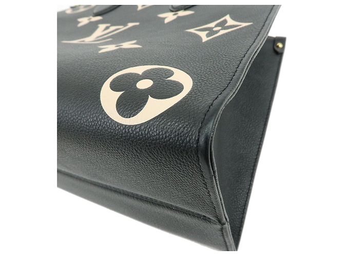 Louis Vuitton Bicolor Monogram Empreinte On The Go MM Noir Beige M45495 - vista 6
