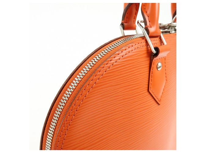 Borsa a mano Louis Vuitton Epi Alma PM Pimont Orange M40623 - vista 15