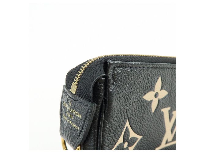 Louis Vuitton Monogram Bicolor Empreinte Mini Pochette Accessory M80732 - vista 12