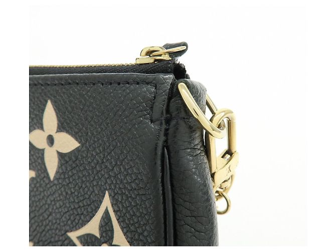 Louis Vuitton Monogram Bicolor Empreinte Mini Pochette Accessory M80732 - vista 13