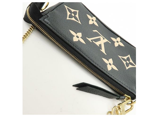 Louis Vuitton Monogram Bicolor Empreinte Mini Pochette Accessory M80732 - vista 16
