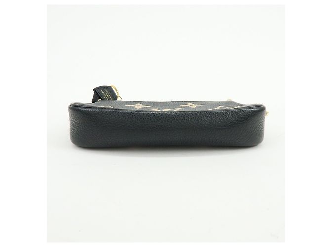 Louis Vuitton Monogram Bicolor Empreinte Mini Pochette Accessory M80732 - vista 5
