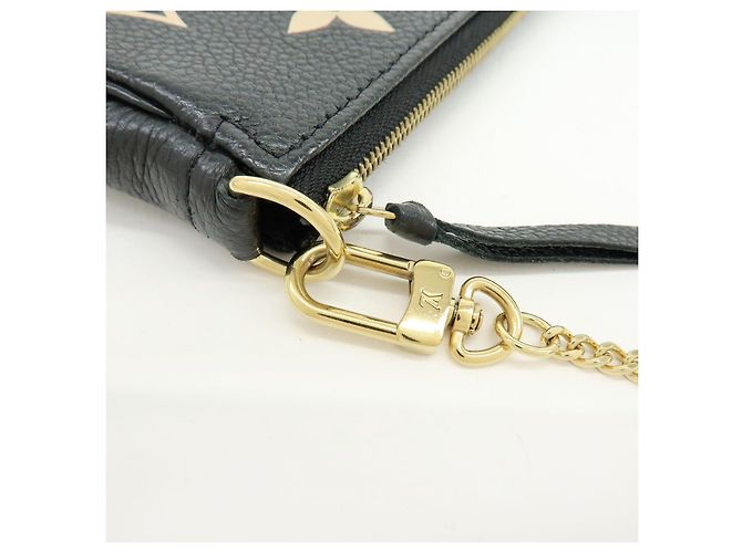 Louis Vuitton Monogram Bicolor Empreinte Mini Pochette Accessory M80732 - vista 7