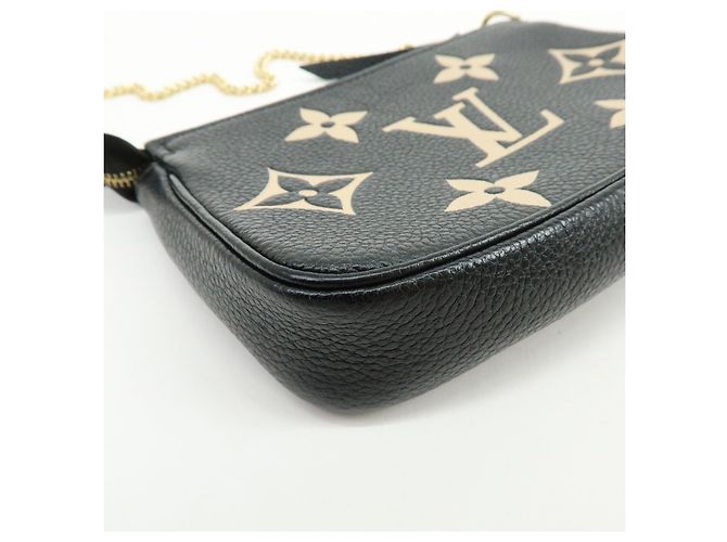 Louis Vuitton Monogram Bicolor Empreinte Mini Pochette Accessory M80732 - vista 8