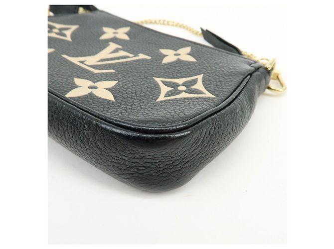 Louis Vuitton Monogram Bicolor Empreinte Mini Pochette Accessory M80732 - vista 9