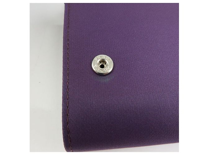 Portafoglio lungo PRADA in nylon e pelle Saffiano con logo triangolare Viola M608 - vista 14