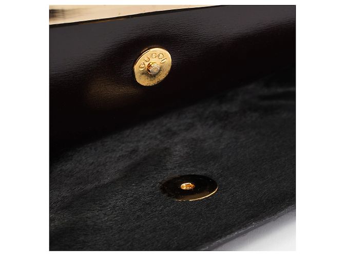 Gucci Clutch in pelliccia nera con placca dorata - vista 7