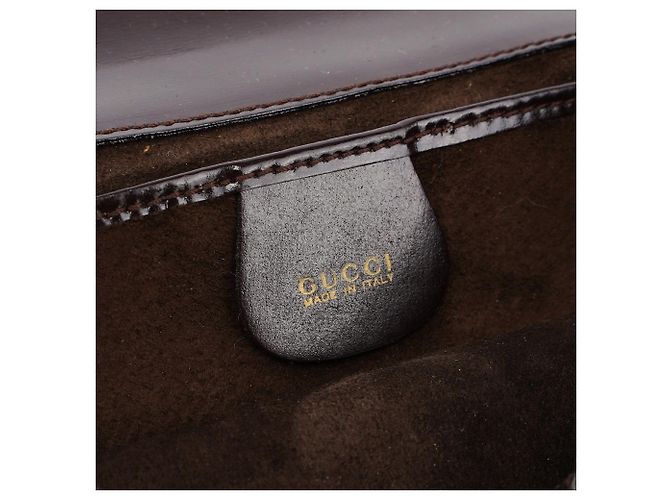 Gucci Clutch in pelliccia nera con placca dorata - vista 8