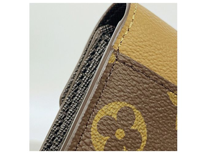 Louis Vuitton Monogram Giant Reverse Portefeuille Sarah Long Wallet - vista 5