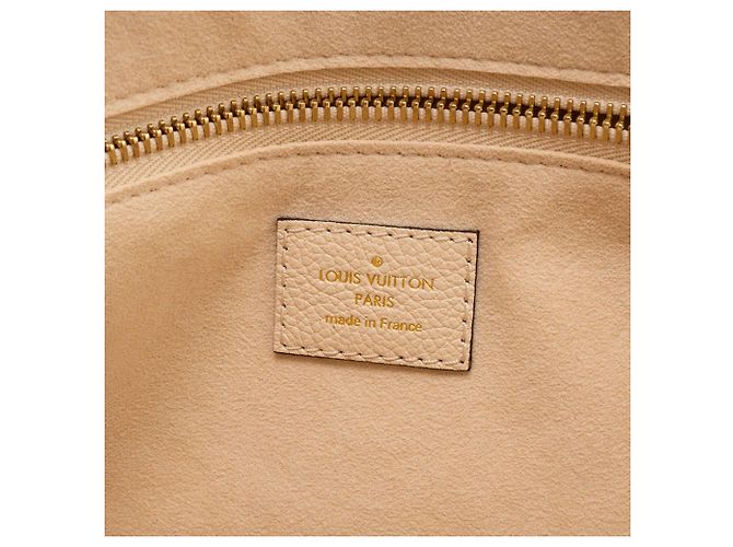 LOUIS VUITTON - Louis Vuitton Neverfull MM Shopper aus beigem Empreinte-Leder - Ansicht 6